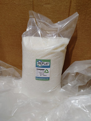 A clear plastic bag containing white pellets, with a label that reads 'REPLAY' and indicates the product is a type of plastic pellet.